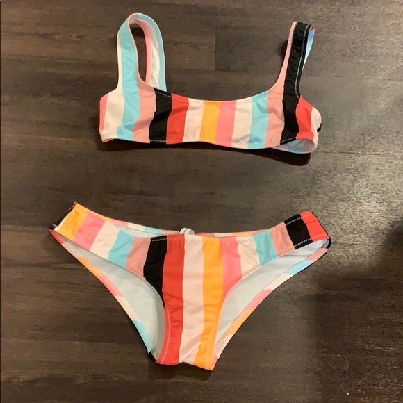 Solid and striped swim suit - Picture 1 of 6